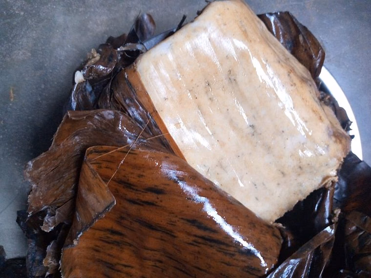 Fante kenkey unwrapped from plantain leaves