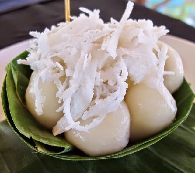 Num plae ai in a banana-leaf cup with coconut