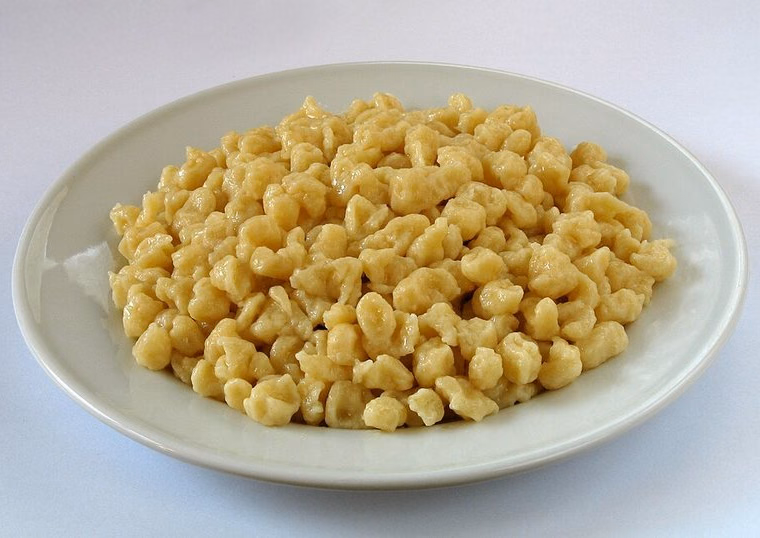 Plate of plain cooked Spätzle; small irregular egg-noodle dumplings. Cooked.